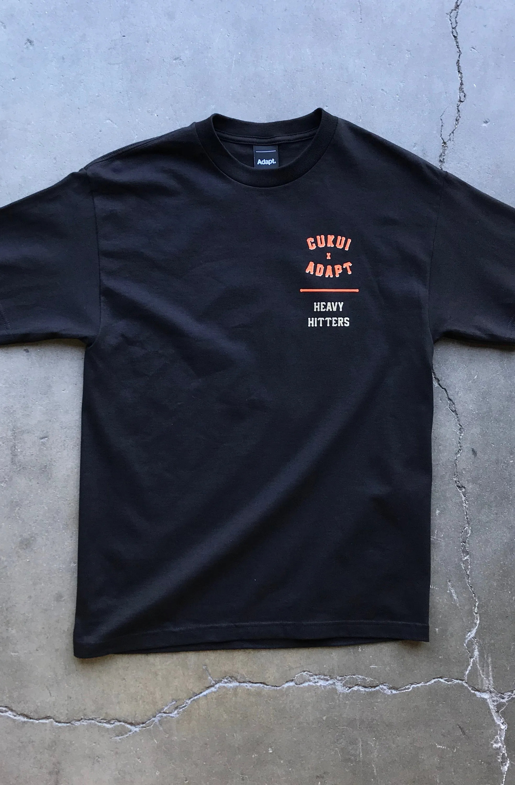 Cukui X Adapt :: Heavy Hitters (Men's Black Tee)
