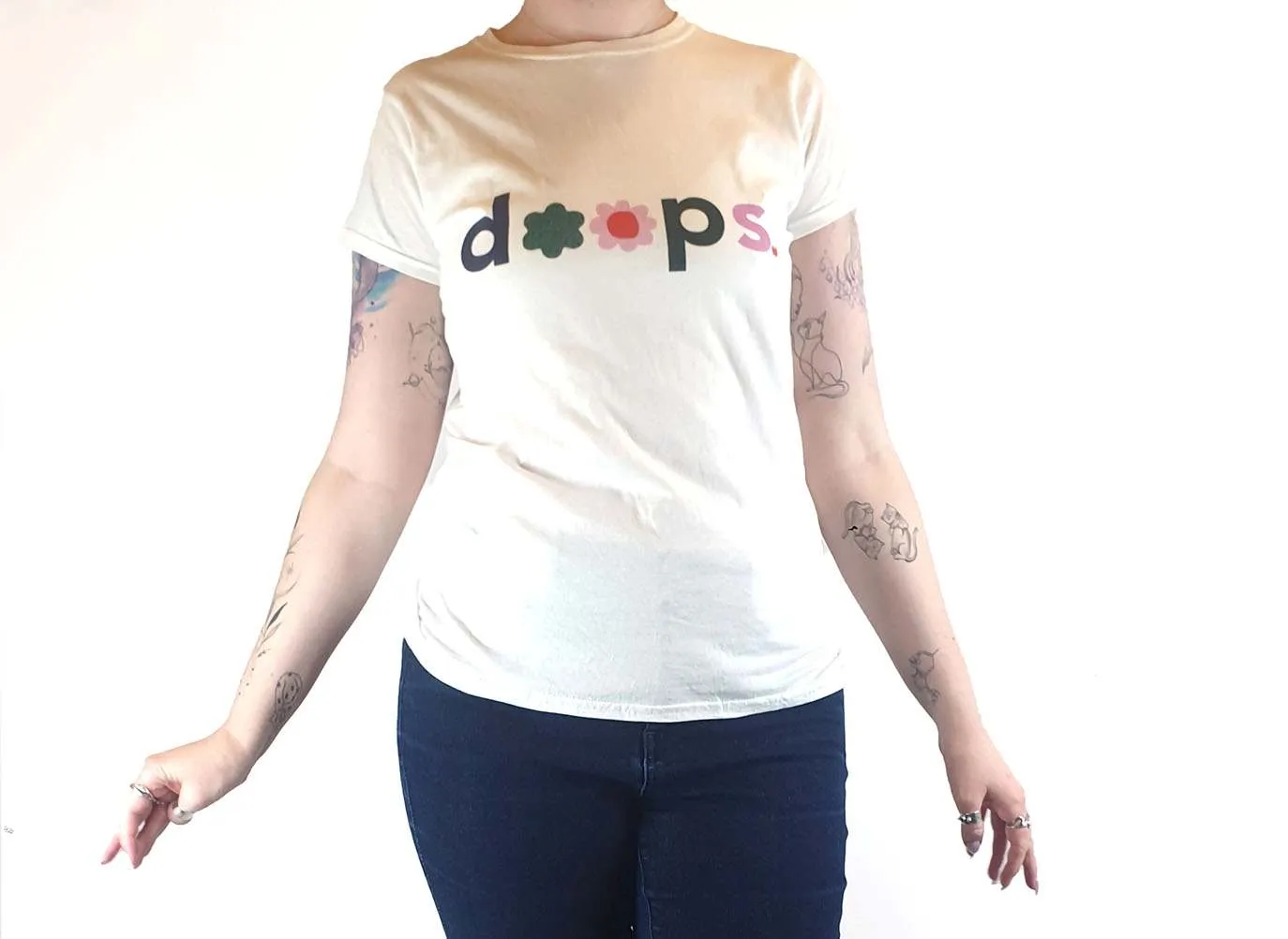 Doops white tee shirt with fun logo size XL (tiny fit, best fits size 12)